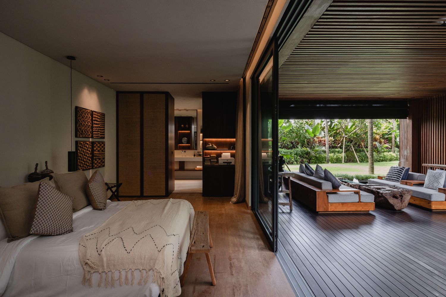 A bedroom opening to its terrace