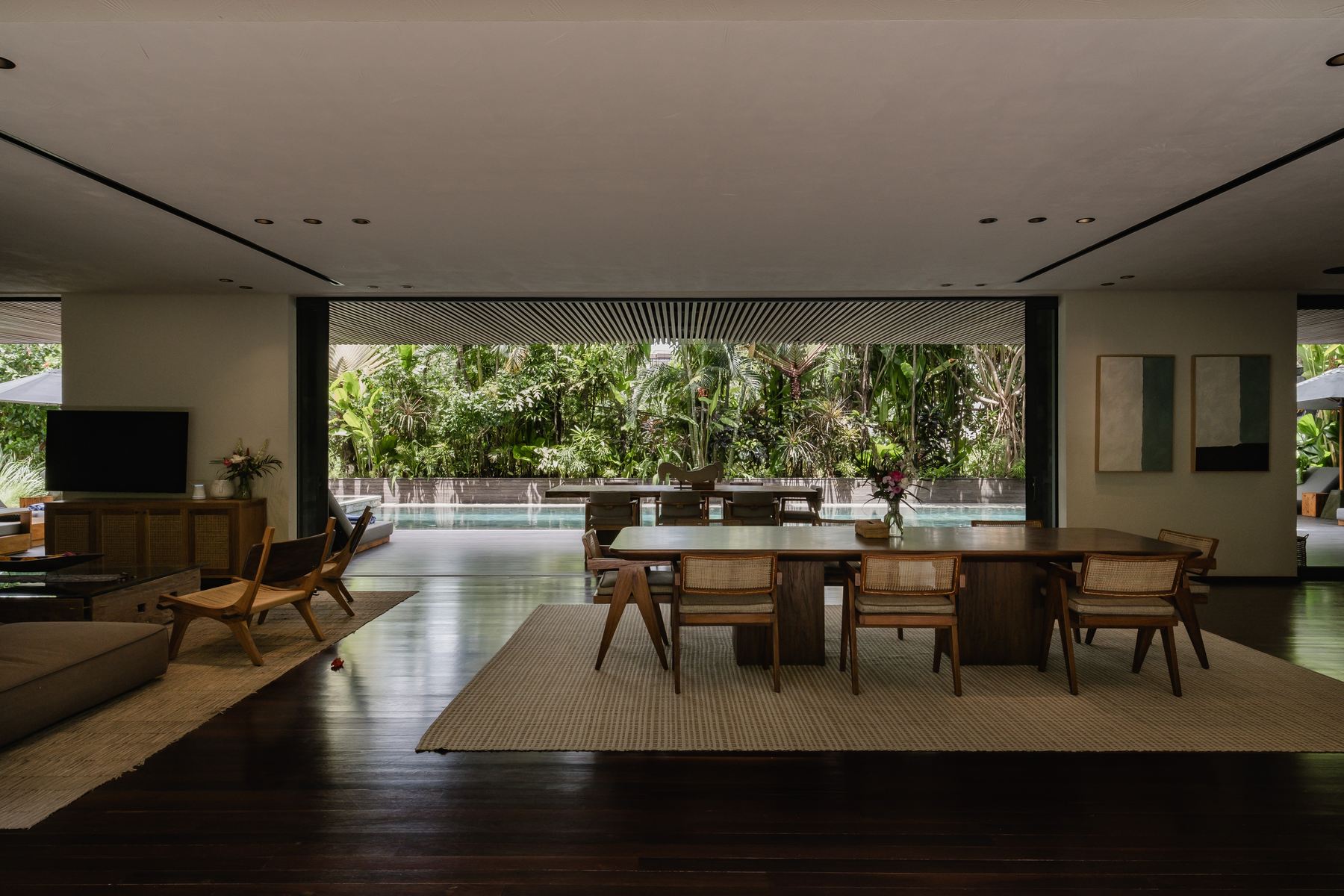 The dining table facing the pool